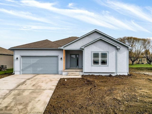 ranch-style home with a garage