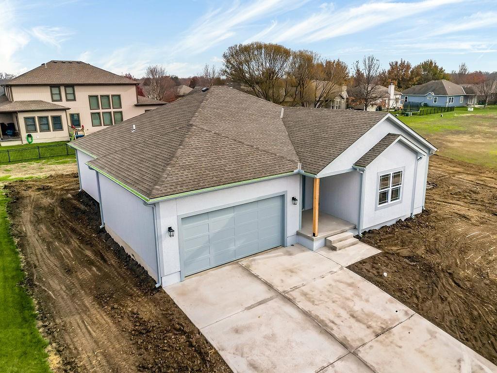 ranch-style home with a garage