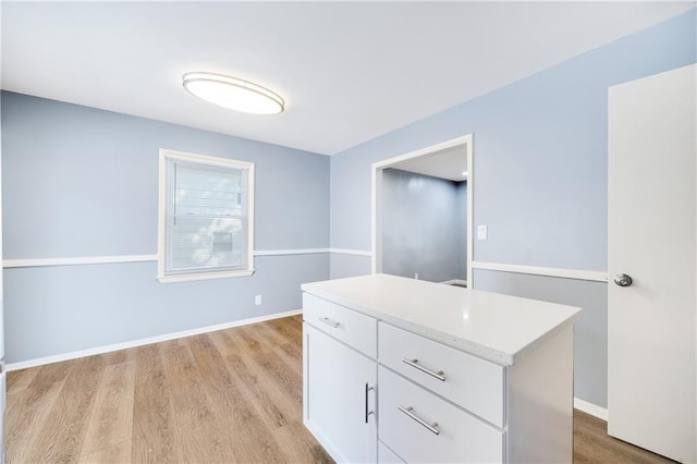 bathroom with wood-type flooring