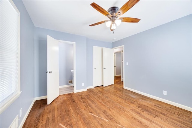 unfurnished bedroom with light hardwood / wood-style flooring and ceiling fan