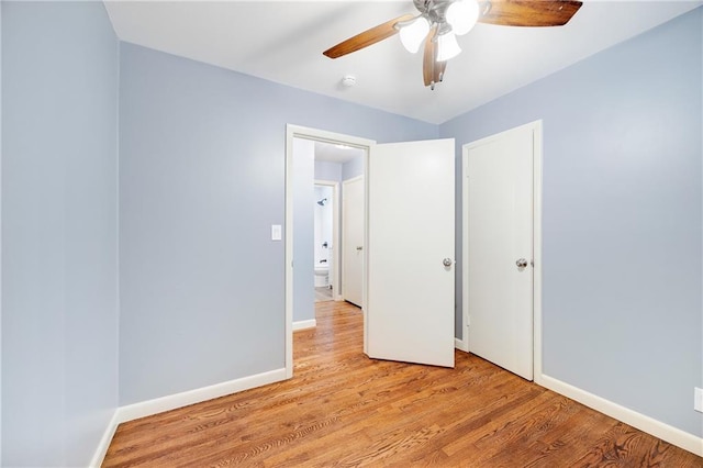 unfurnished bedroom featuring light hardwood / wood-style floors and ceiling fan