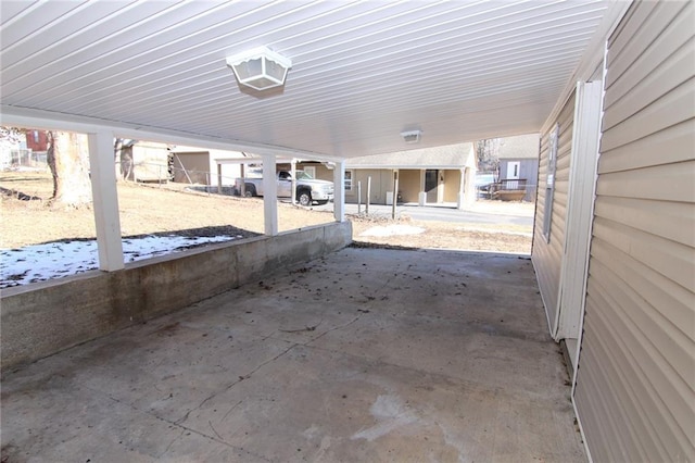 view of patio / terrace with a carport