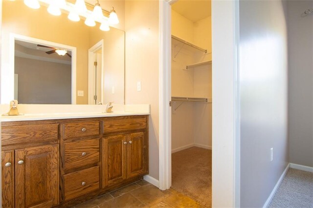 bathroom with vanity, tile patterned flooring, and ceiling fan