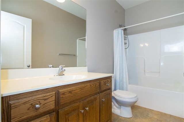 full bathroom with vanity, shower / bath combo with shower curtain, toilet, and tile patterned floors