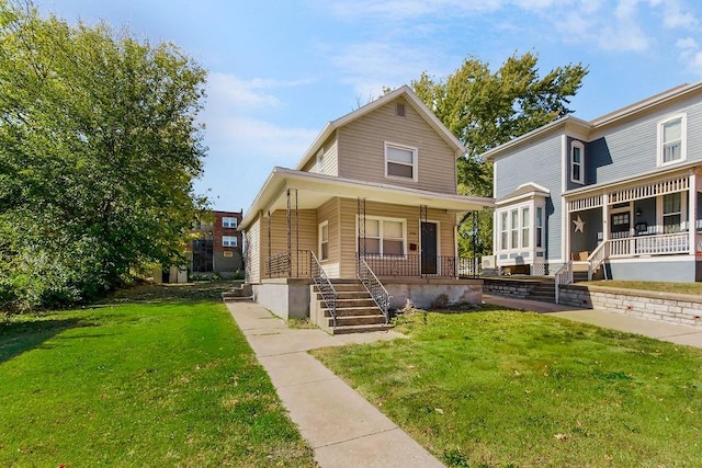 view of front of property featuring a front yard and covered porch