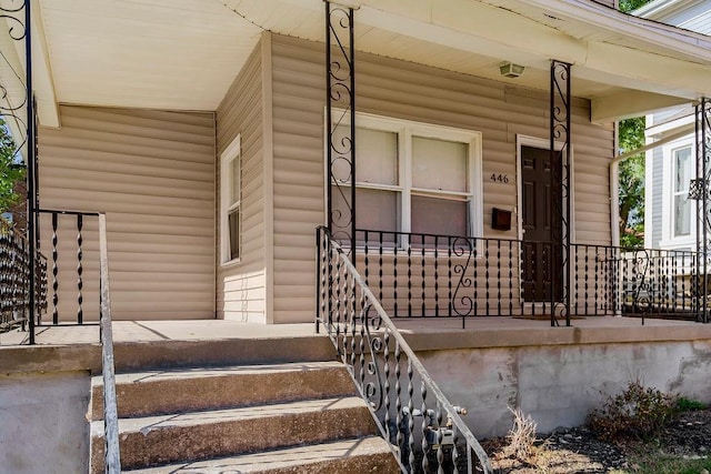 446 Montgall Ave, Kansas City, MO 64124 - property entrance featuring covered porch