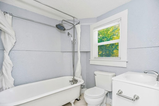 446 Montgall Ave, Kansas City, MO 64124 - full bathroom with a sink, a bath, a textured wall, toilet, and a textured ceiling
