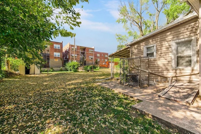 446 Montgall Ave, Kansas City, MO 64124 - view of yard with a shed, an outbuilding, and central AC