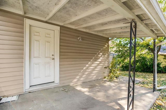 446 Montgall Ave, Kansas City, MO 64124 - view of exterior entry featuring a patio area