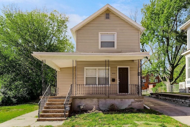 446 Montgall Ave, Kansas City, MO 64124 - view of front of property featuring covered porch