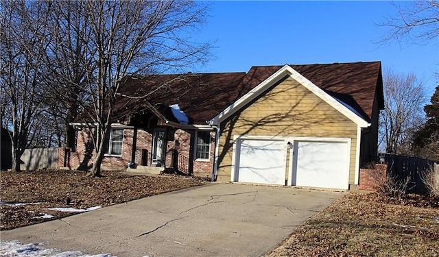 view of front of property featuring a garage