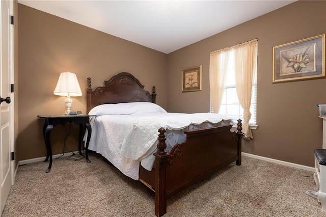 bedroom with light carpet