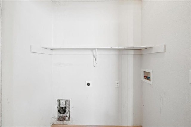 washroom with washer hookup and hookup for an electric dryer