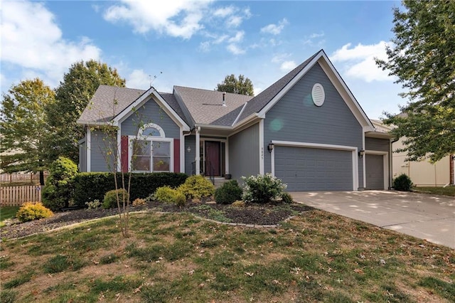 single story home with a front yard and a garage