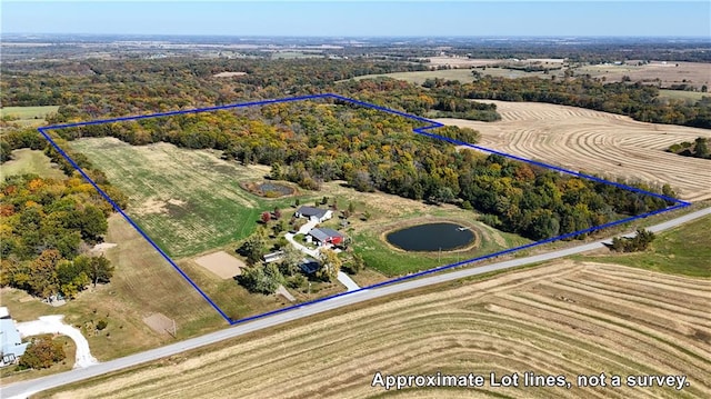 bird's eye view featuring a rural view and a water view