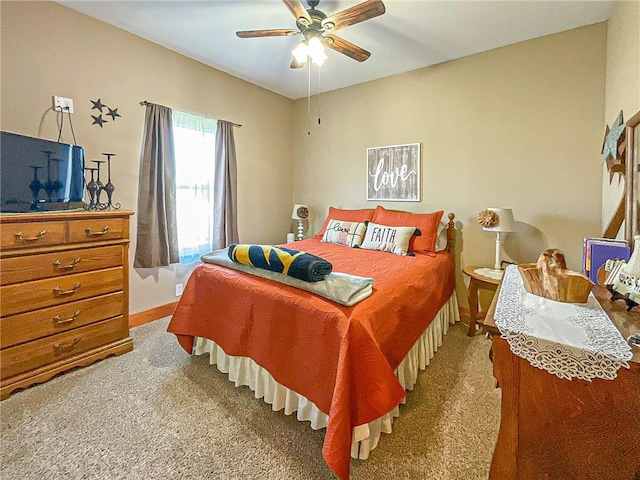 bedroom featuring ceiling fan and carpet floors