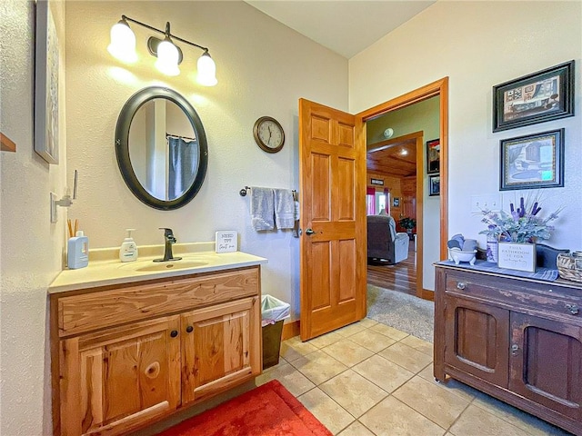 bathroom with vanity and tile patterned floors