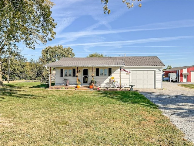 ranch-style house with a garage and a front lawn