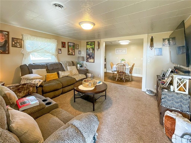 living room featuring carpet flooring