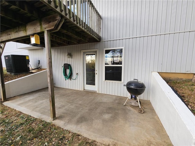 view of patio / terrace featuring central AC unit and a grill