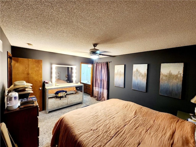 bedroom with light colored carpet, a textured ceiling, and ceiling fan