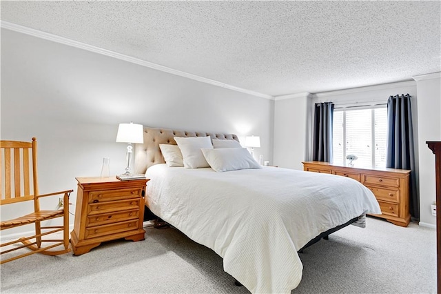 bedroom featuring a textured ceiling, light colored carpet, and crown molding