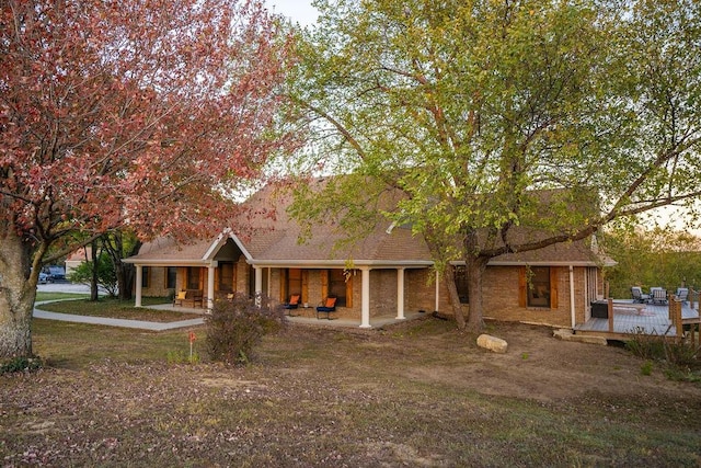 view of front facade with a deck