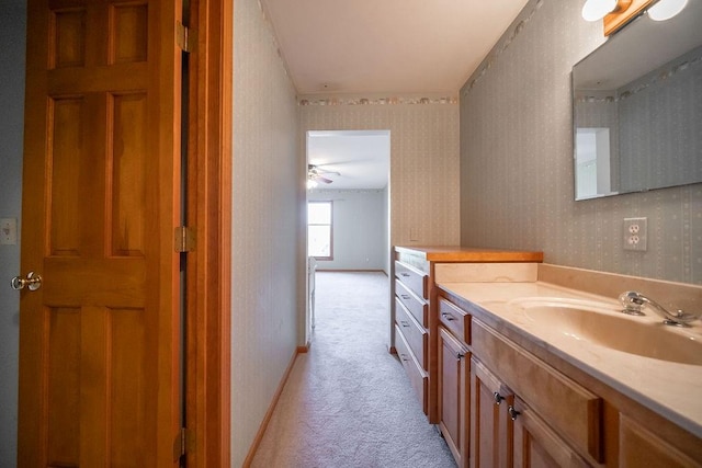 bathroom with vanity and ceiling fan