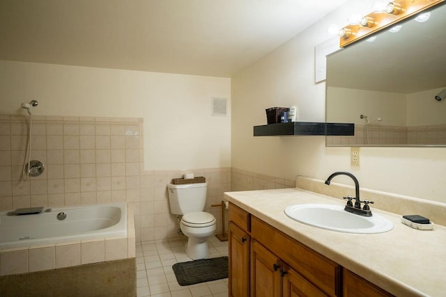 full bathroom with plus walk in shower, toilet, tile walls, tile patterned floors, and vanity