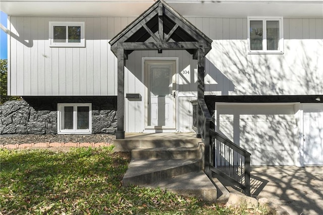 property entrance with a garage