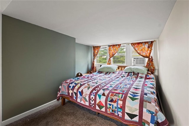 bedroom with cooling unit and carpet floors