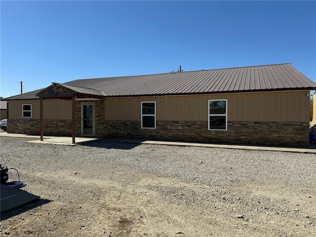 rear view of property with a patio area