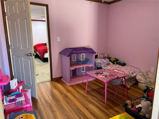 bedroom featuring hardwood / wood-style floors