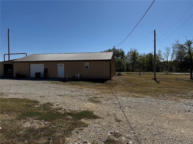 view of outdoor structure with a garage