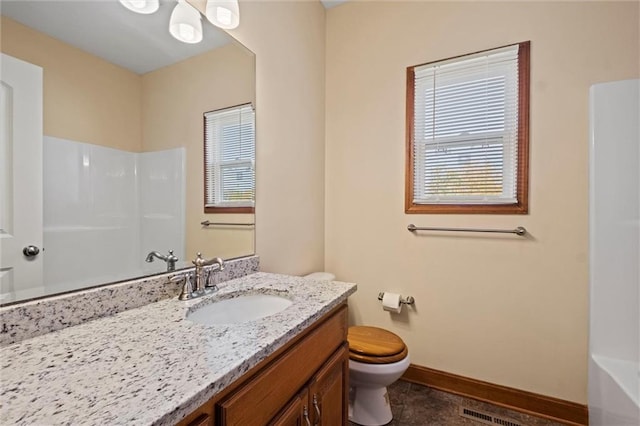 full bathroom with vanity, toilet, separate shower and tub, and plenty of natural light