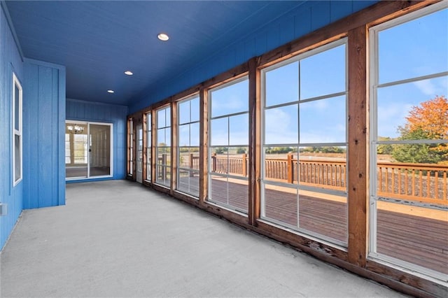 sunroom / solarium featuring a healthy amount of sunlight