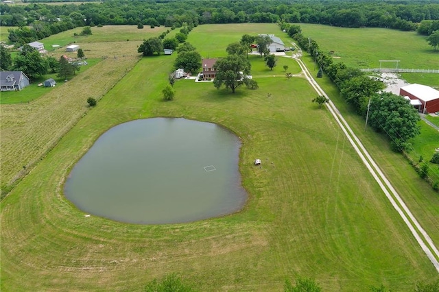 bird's eye view featuring a water view and a rural view