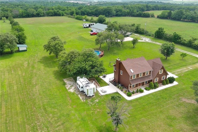 birds eye view of property featuring a rural view