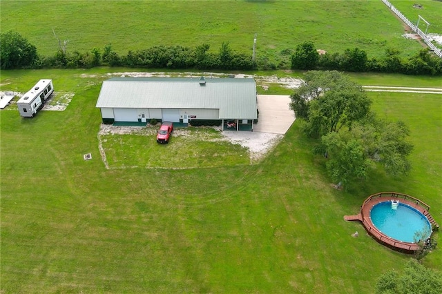 birds eye view of property featuring a rural view