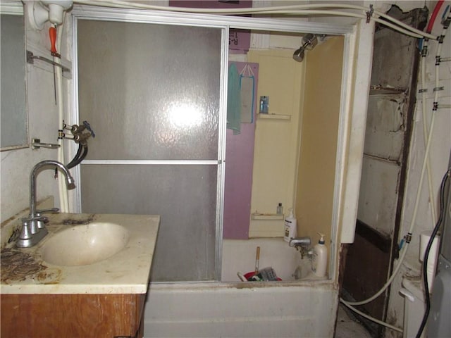 bathroom with vanity and shower / tub combination