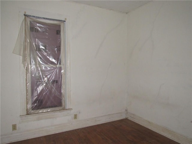 empty room featuring hardwood / wood-style floors