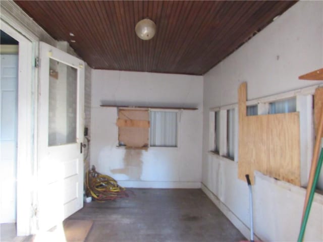 interior space with lofted ceiling and wooden ceiling