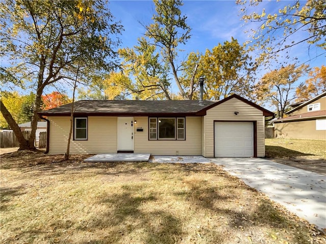 ranch-style home with a garage