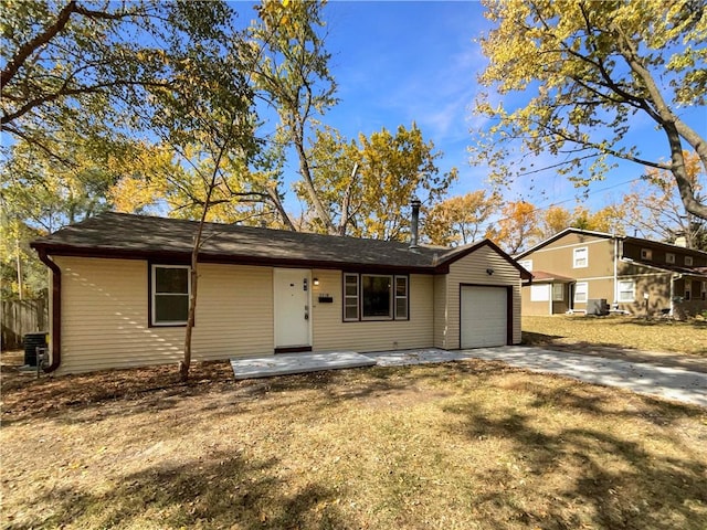 ranch-style house featuring a garage