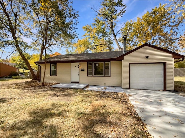 ranch-style home with a garage