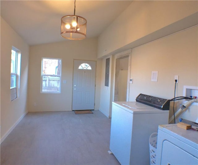 laundry room with separate washer and dryer, electric panel, and dark carpet