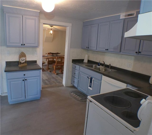 kitchen featuring sink, extractor fan, white appliances, and light hardwood / wood-style flooring