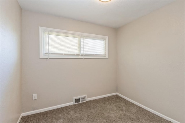 view of carpeted spare room