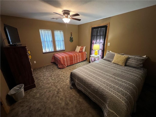 bedroom with ceiling fan and carpet flooring