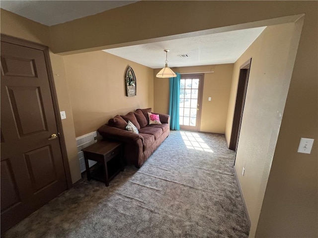 living room featuring carpet